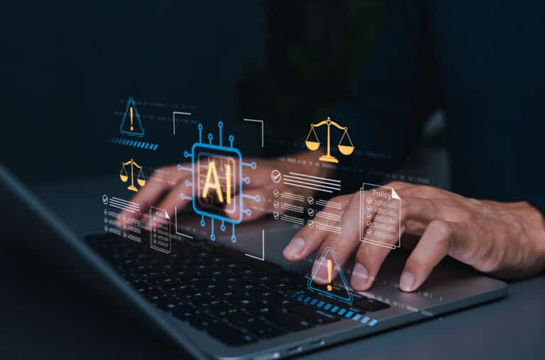 Person typing on a laptop with holographic AI and legal/policy icons floating above the keyboard, conveying AI and law collaboration.